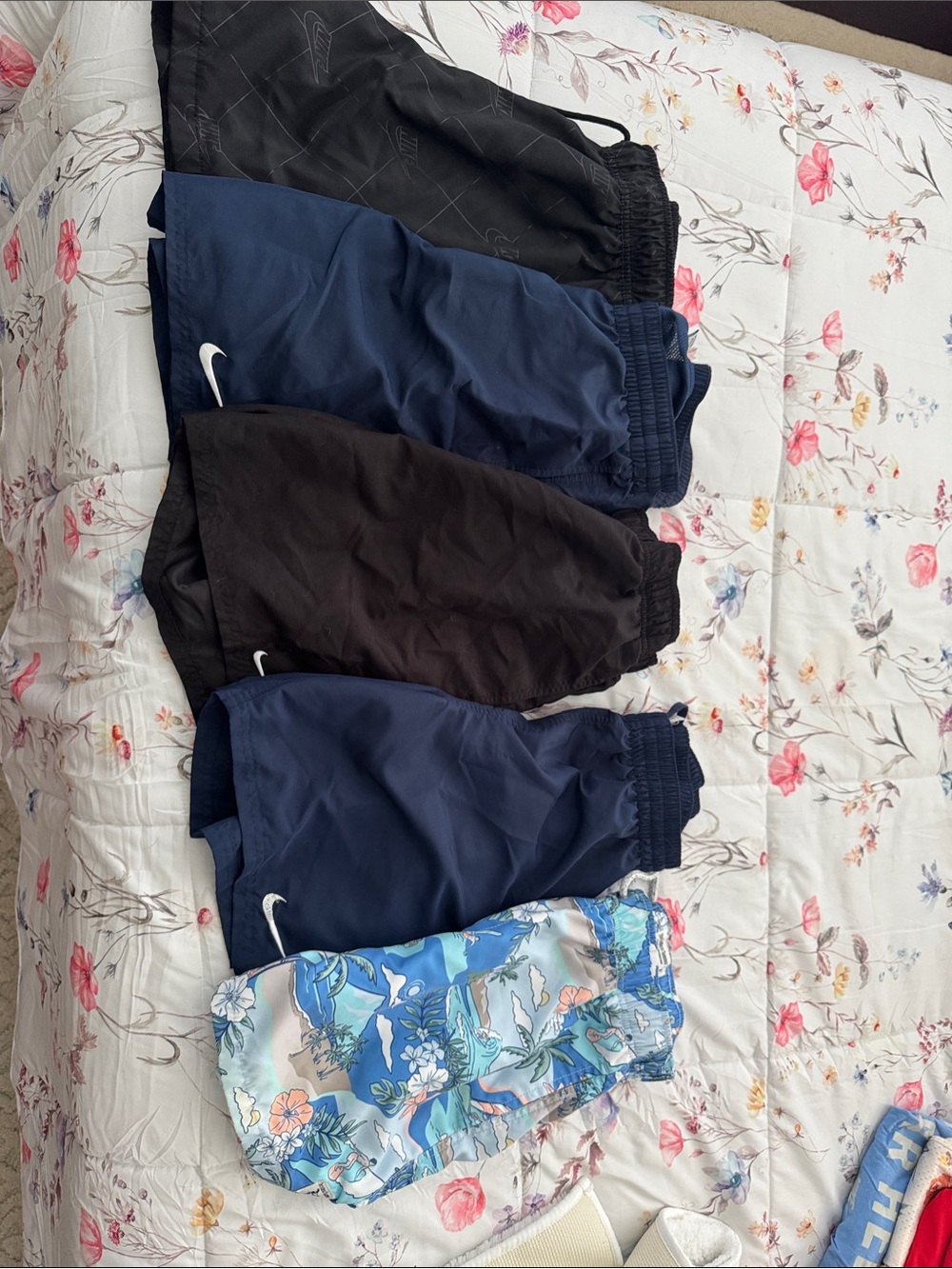 Nike Boys Navy, Black, and Floral Blue Athletic Shorts Set